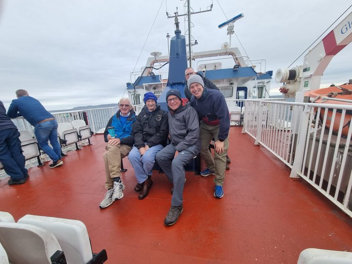 Club members travelling together by ferry to an event.