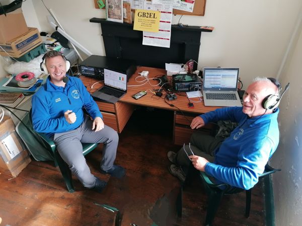 Radio operators at an indoor lighthouse activation station